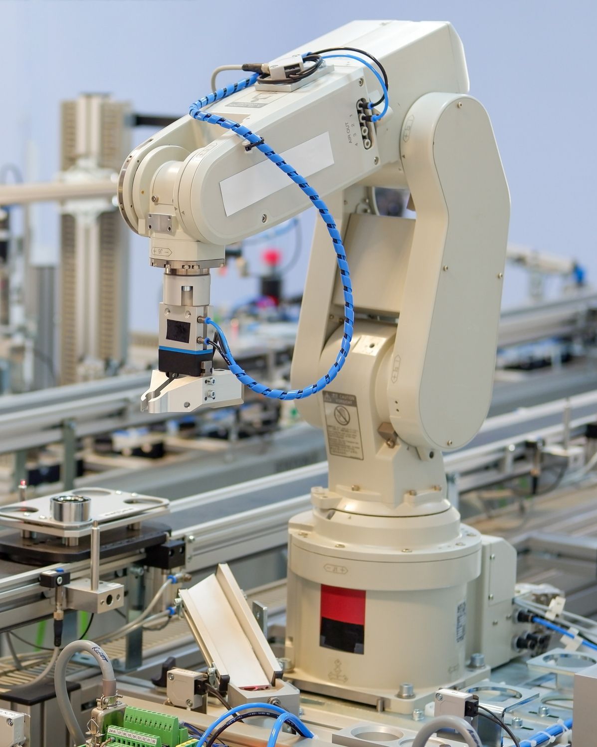 Robotic arm on assembly line