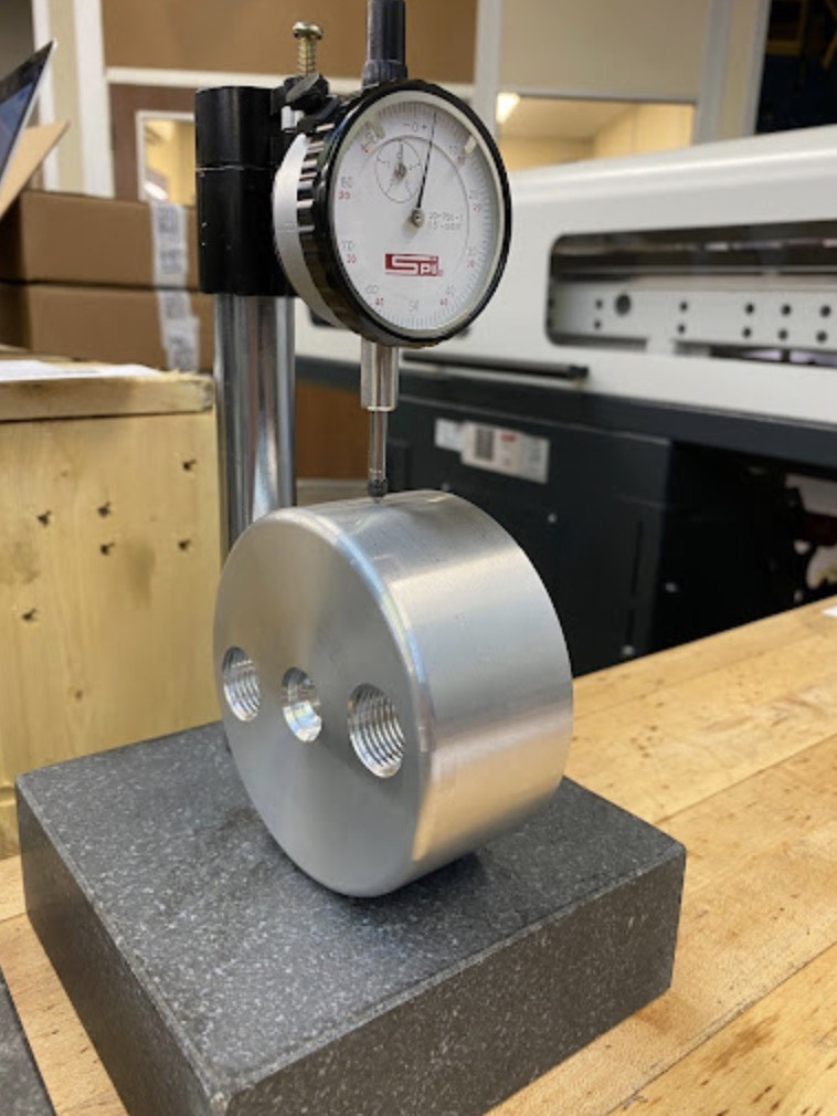 metal part on a scale